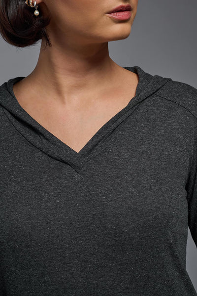 A female model wearing the women's Heather Hoodie Shirt in the color dark heather charcoal, showing the modern fit from a closeup collar front view. This hoodie shirt is made in the USA. #color_dark-heather-charcoal