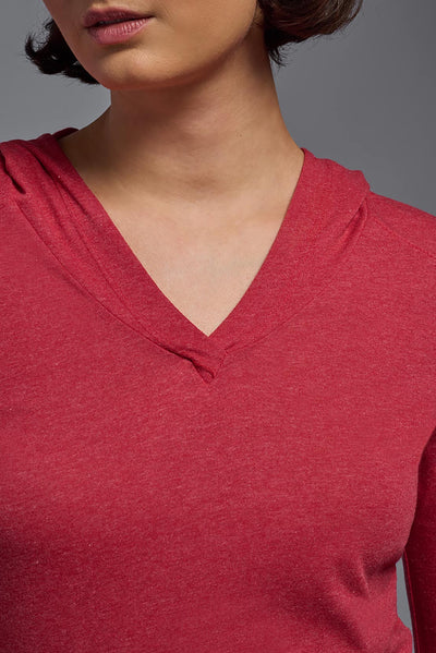 A female model wearing the women's Heather Hoodie Shirt in the color dark heather red, showing the modern fit from a closeup v-neck collar view. This hoodie shirt is made in the USA. #color_dark-heather-red
