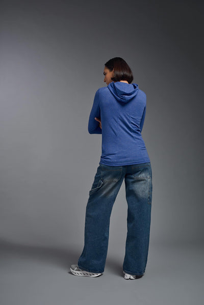A female model wearing the women's Heather Hoodie Shirt in the color dark heather royal blue, showing the modern fit from a back view. This hoodie shirt is made in the USA. #color_dark-heather-royal